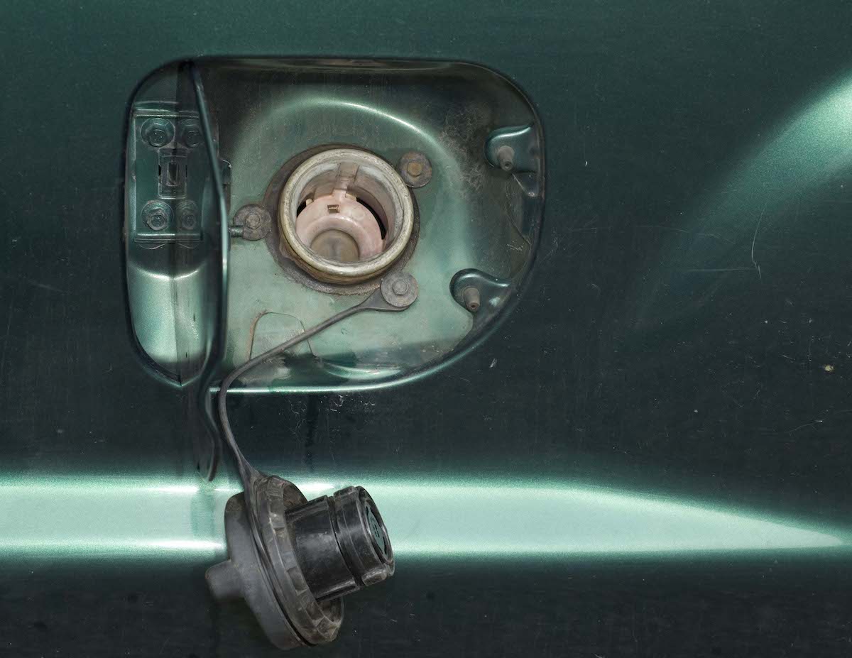 Gas tank filler neck, with gas cap, on a 1999 Mazda B2500 pickup