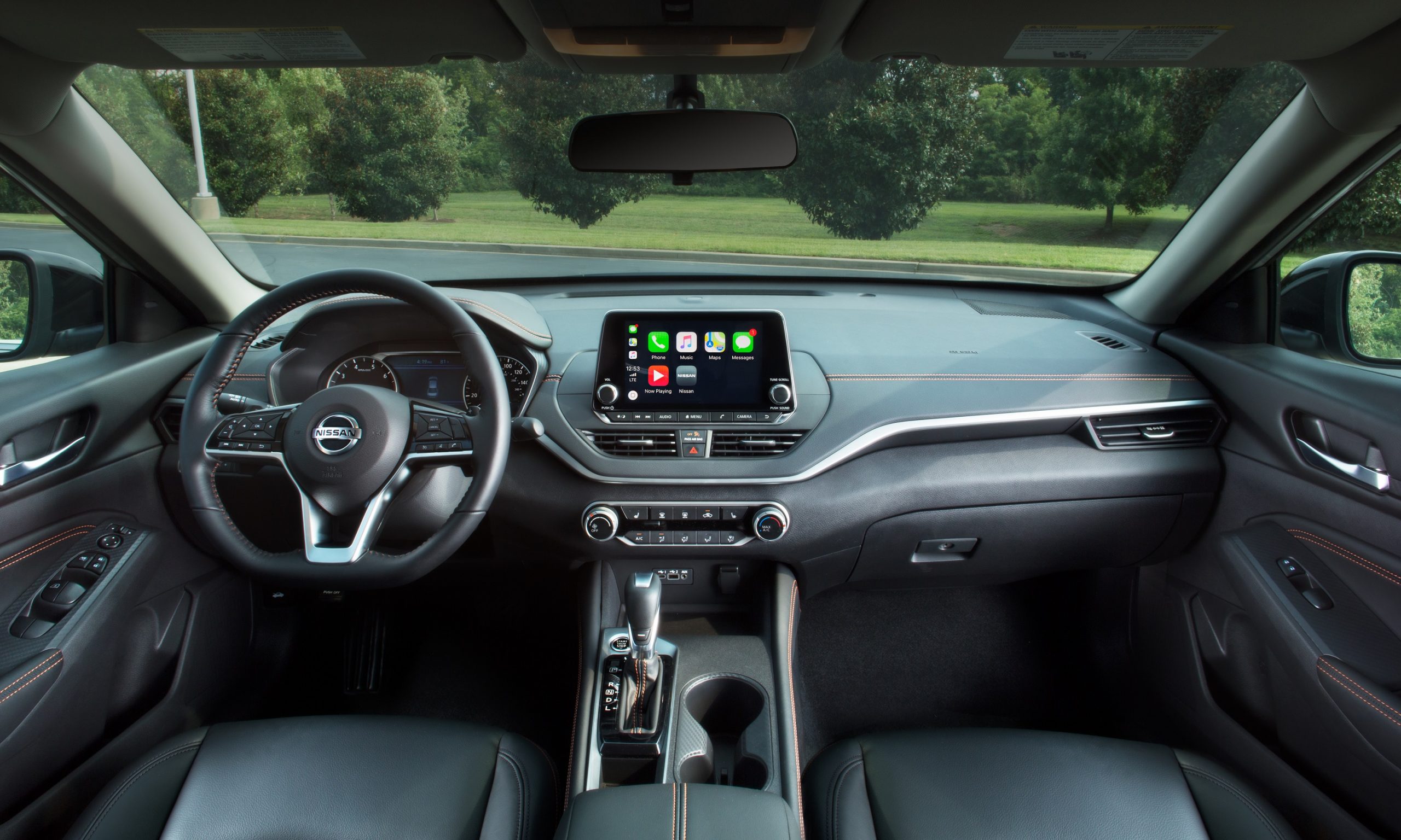 The interior of the 2022 Nissan Altima with black leather