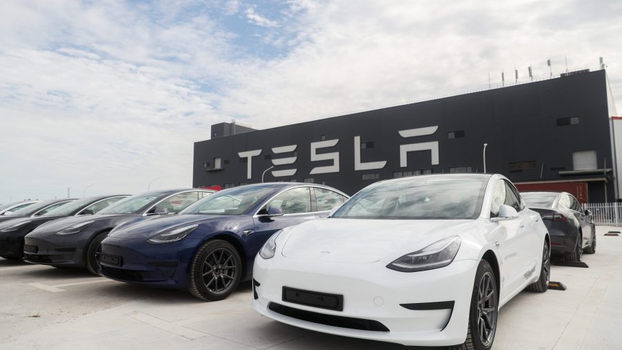 A line of Tesla Model 3 EVs outside a Tesla factory in China