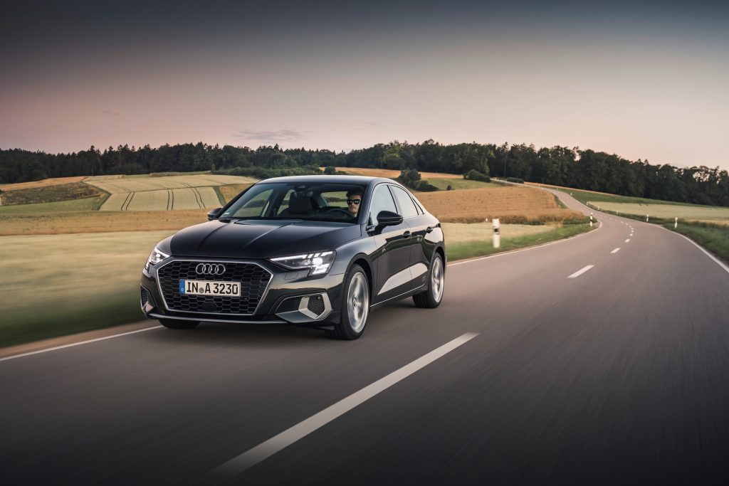 The 2022 Audi A3 driving down the road
