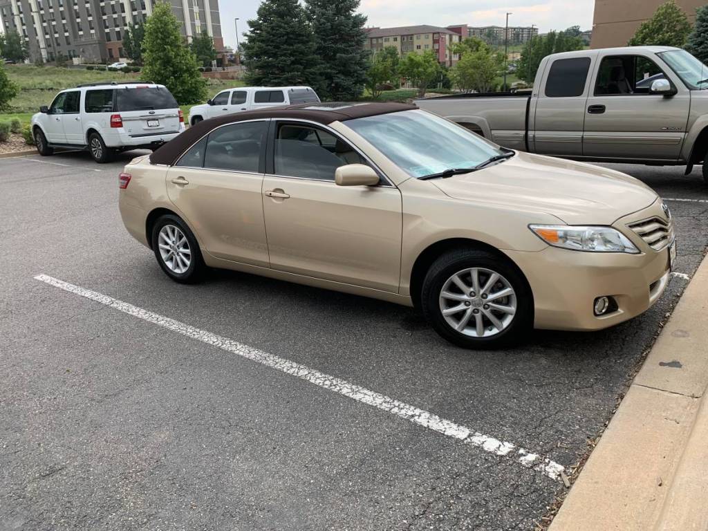 2011 Toyota Camry with a landau top.