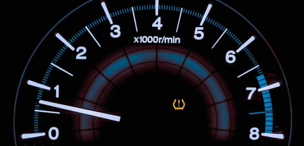 Tire Pressure Light on speedometer shows low tire pressure warning 