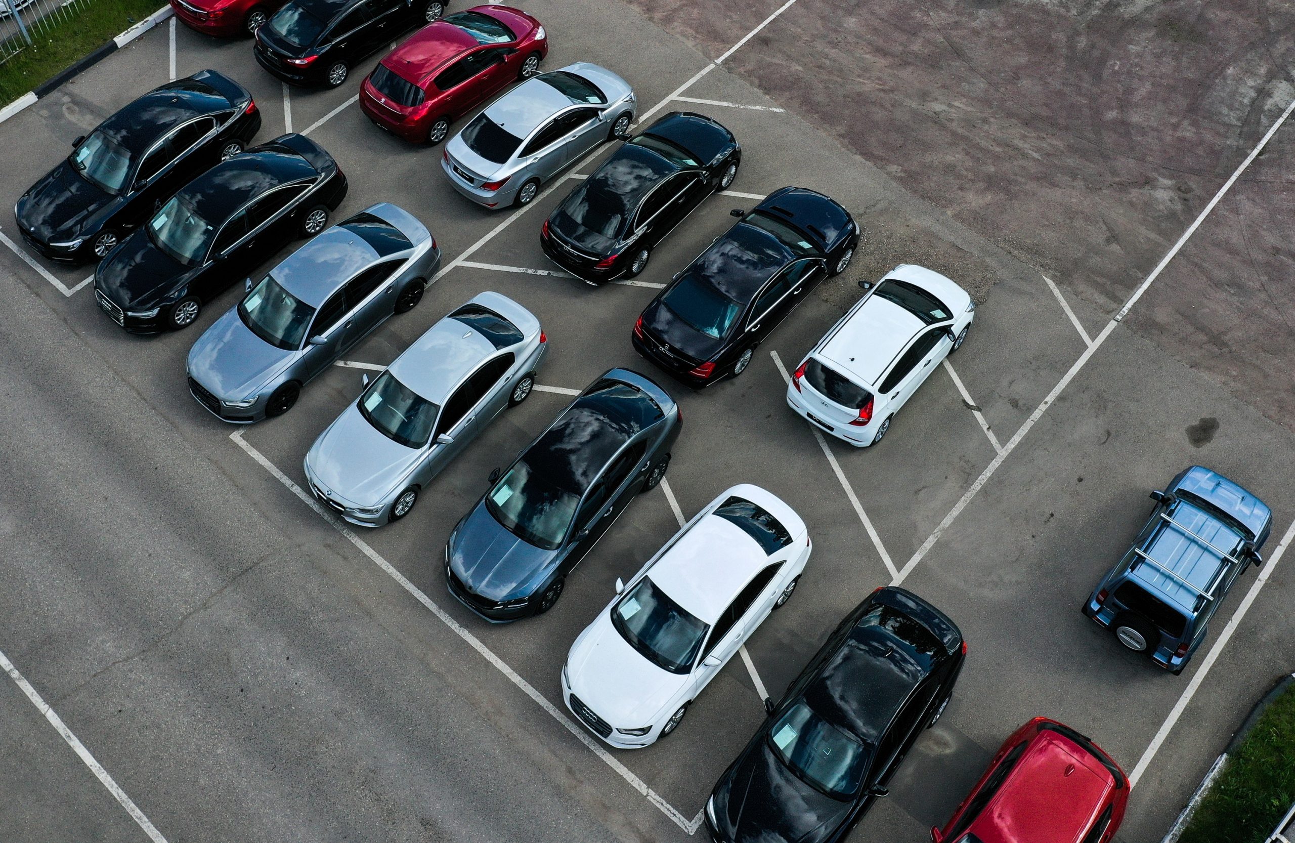 An aerial shot of a used car lot, shown full despite the rise in used and new car prices 