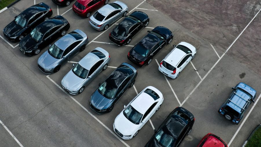 An aerial shot of a used car lot, shown full despite the rise in used and new car prices