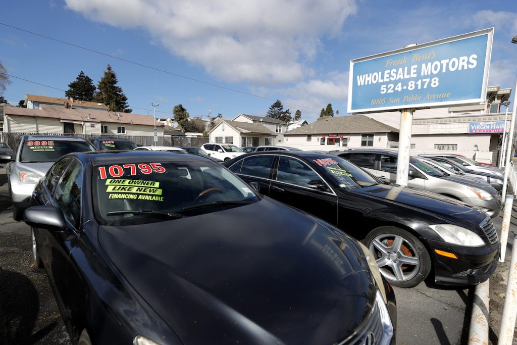 Used cars sit on a sales lot in March 2021 in El Cerrito, California