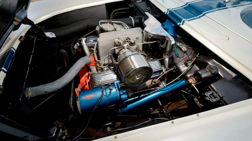 The fuel-injected V8 in the white-with-blue-stripes 1957 Chevrolet Corvette Super Sport