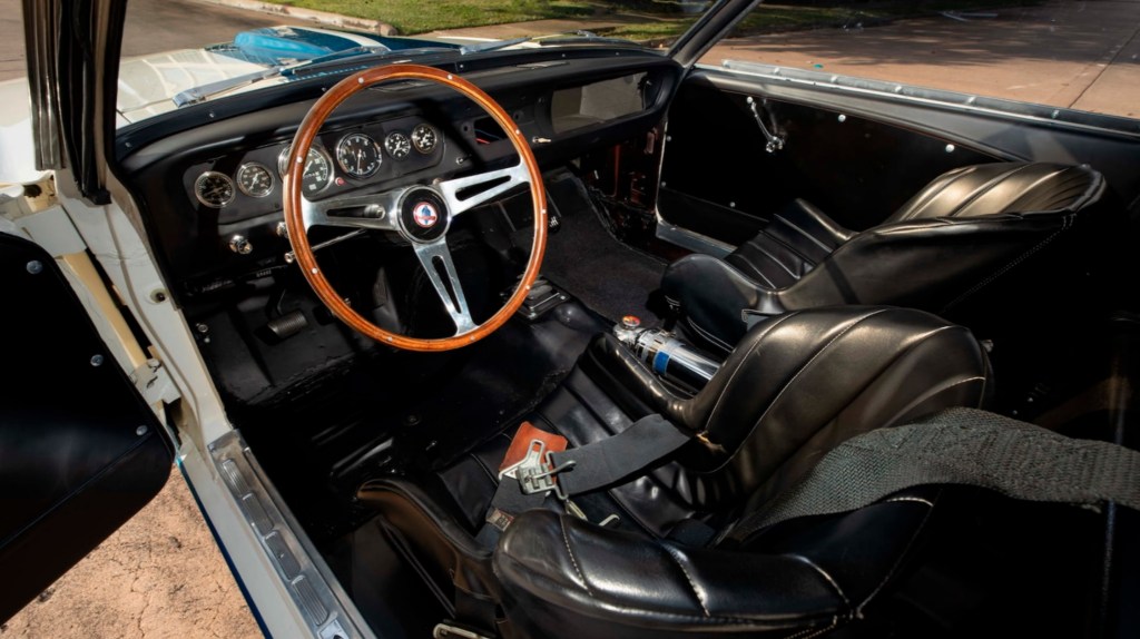 The black-leather-racing seats and interior of the white-with-blue-stripes 1965 Shelby GT350R Mustang prototype