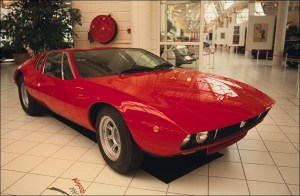 A red 1966 De Tomaso Mangusta on display in Paris in 1991