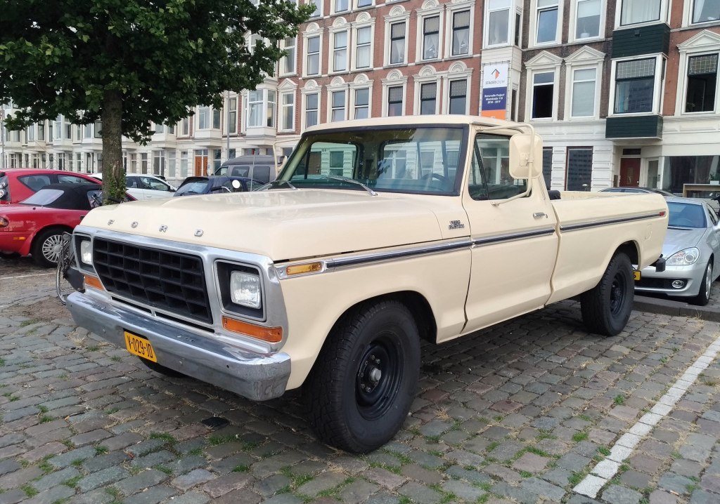 this 1979 Ford F250 in pale yellow is a great option for one of the best hunting trucks for cheap