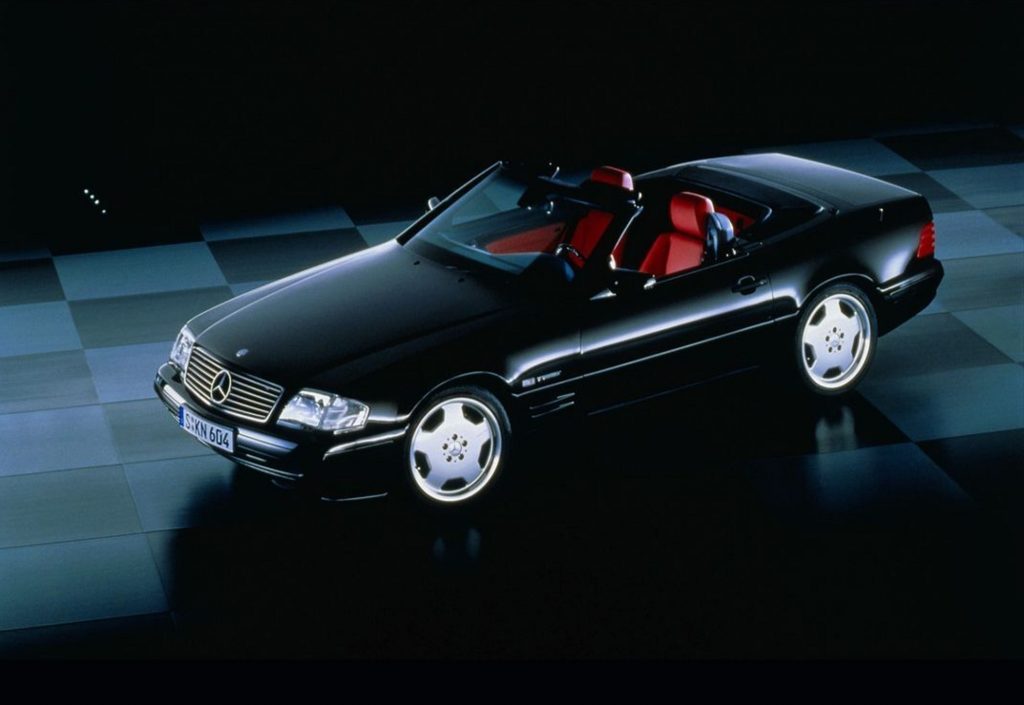 A black 1998 R129 Mercedes SL Special Edition with a red interior