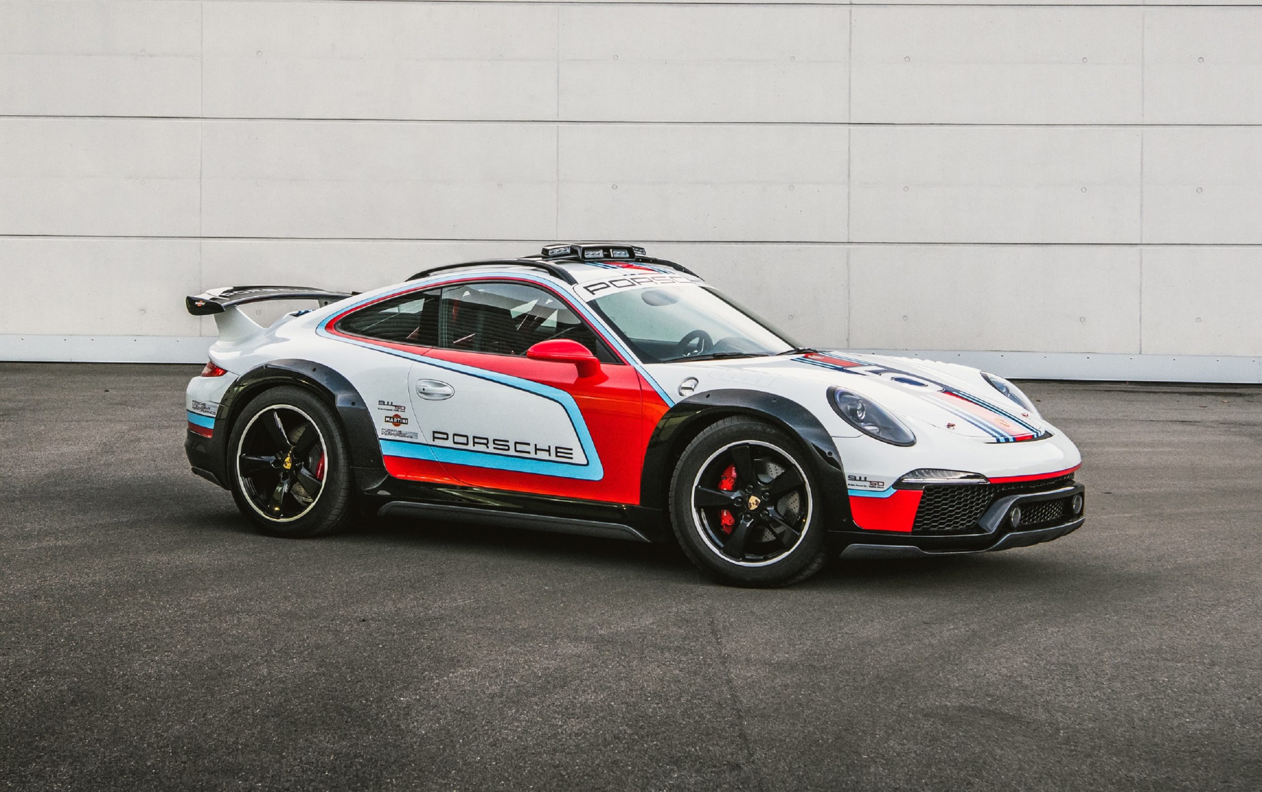 The white-red-and-blue 2012 Porsche 911 Vision Safari concept