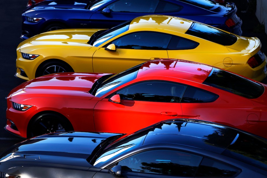 2015 Ford Mustang coupes sit in a parking lot in West Hollywood, California, in 2014