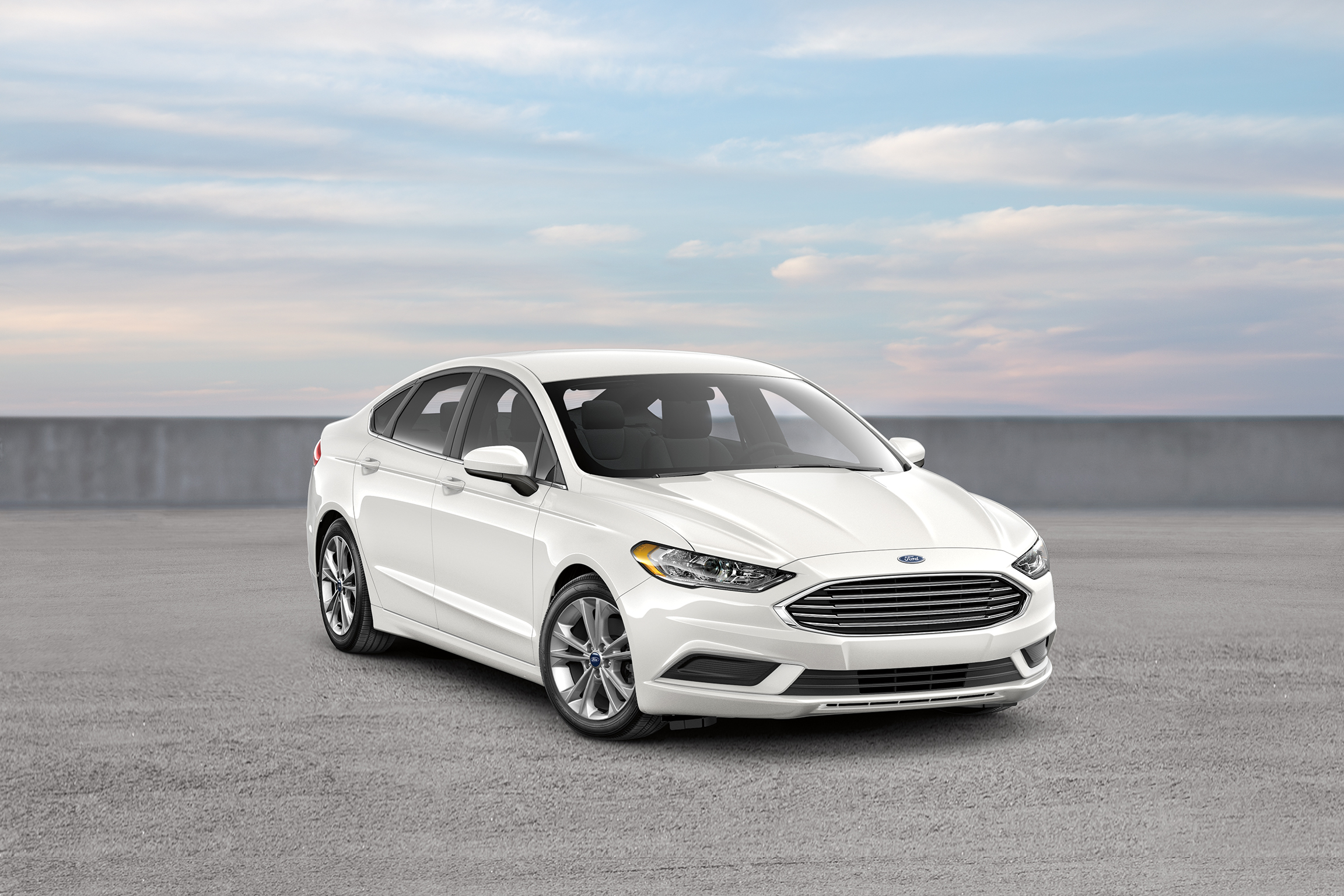A white 2018 Ford Fusion shot from the front 3/4