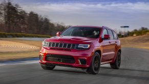Red 2021 Jeep Grand Cherokee Trackhawk on the race track