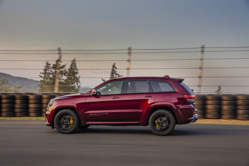This red 2021 Jeep Grand Cherokee Trackhawk accelerates faster than the Charger SRT Hellcat Redeye widebody | Stellantis