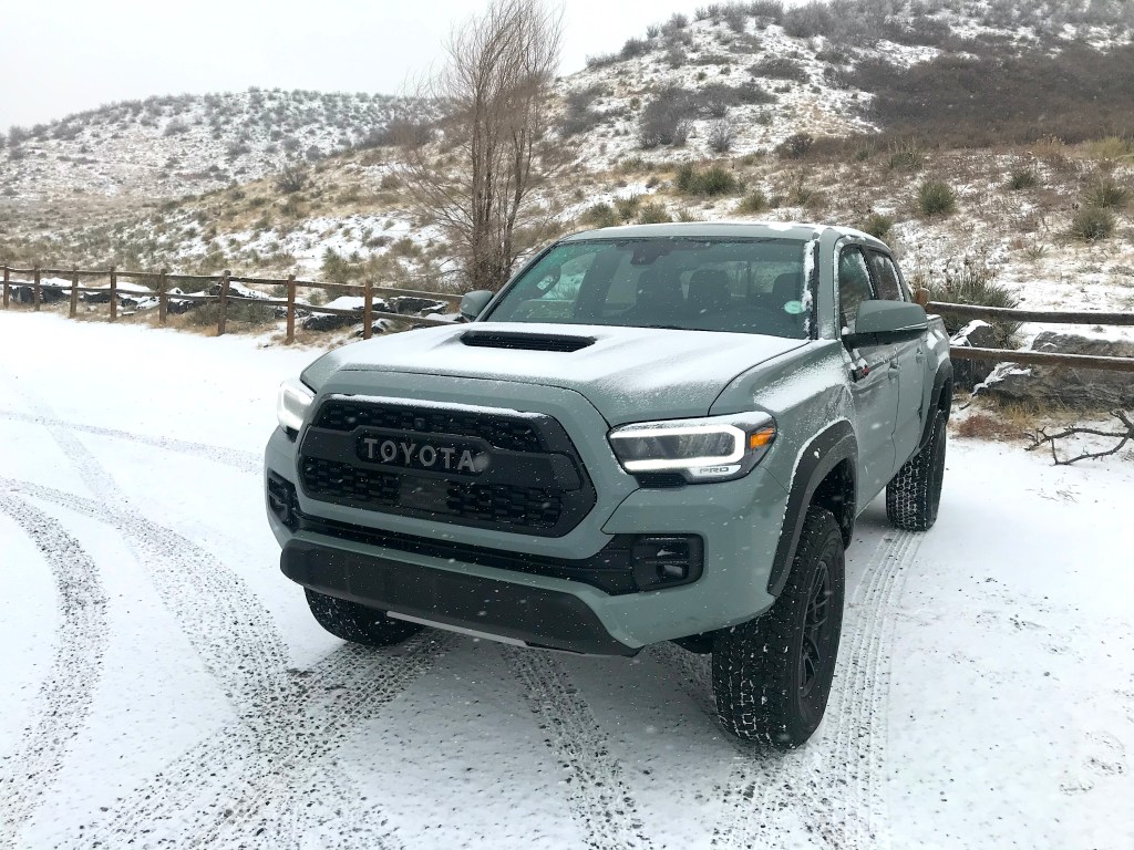 Toyota Tacoma TRD in the snow wearing Lunar Rock paint.