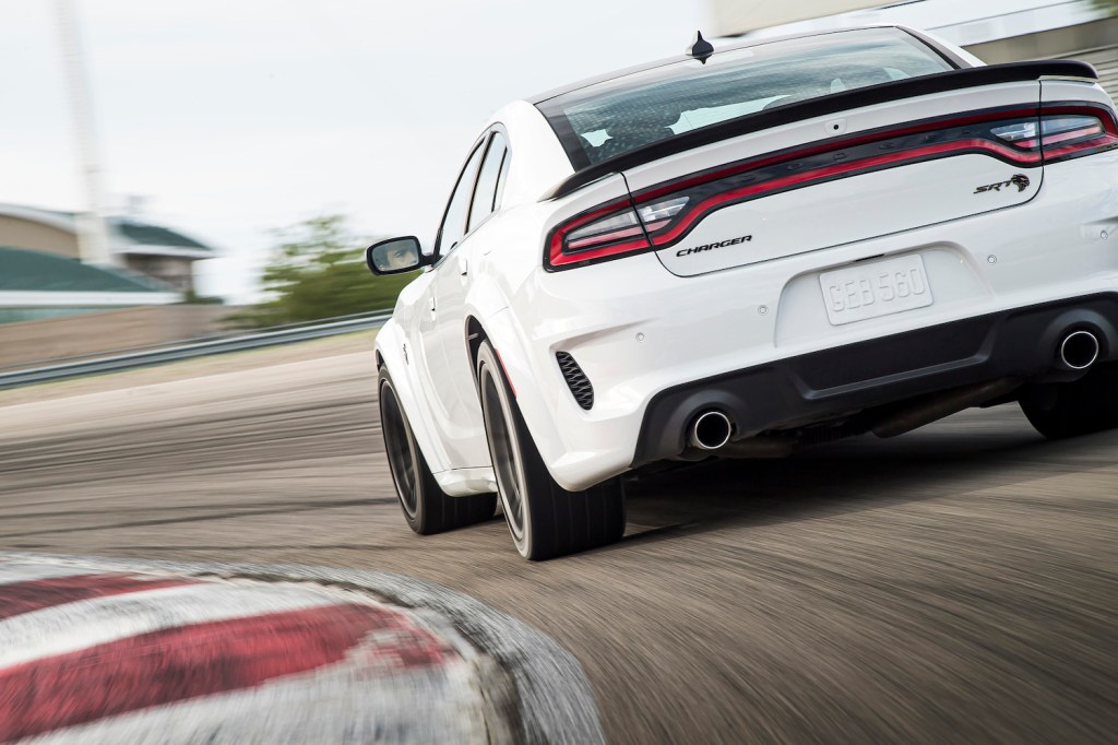The 2022 Dodge Charger SRT Hellcat Redeye tearing up a race track | Stellantis