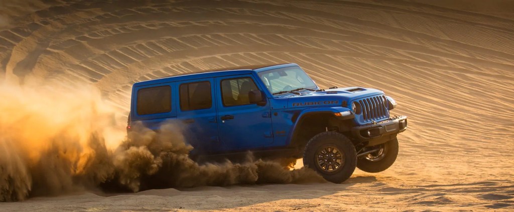 A blue 2022 Jeep Wrangler Rubicon 392 driving through the desert.