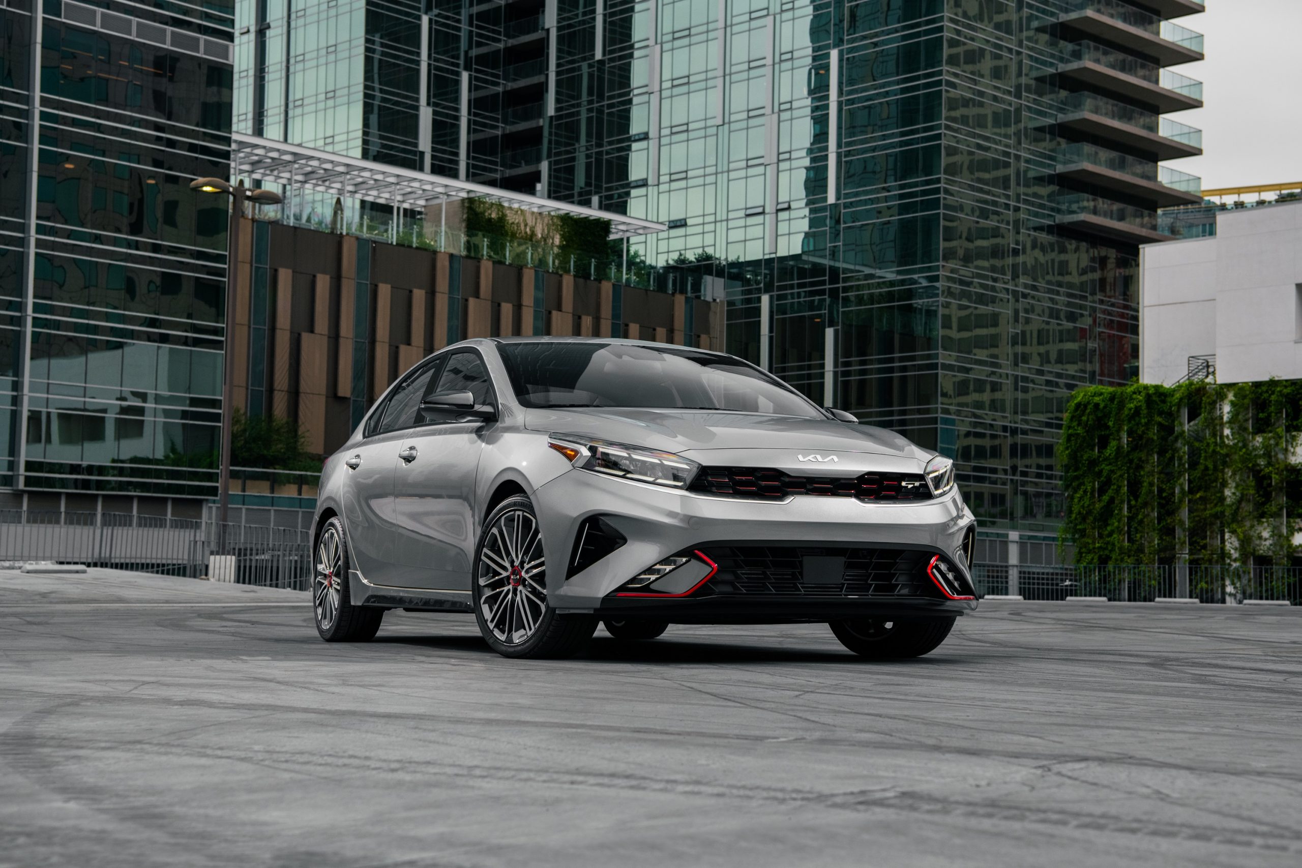 A grey 2022 Kia Forte, one of Consumer Reports' picks for the worst new cars, shot from the front 3/4 in silver