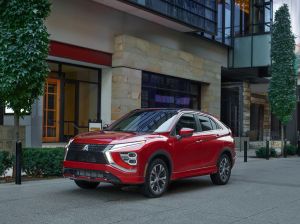 The 2022 Mitsubishi Eclipse Cross compact crossover SUV with a red paint color option