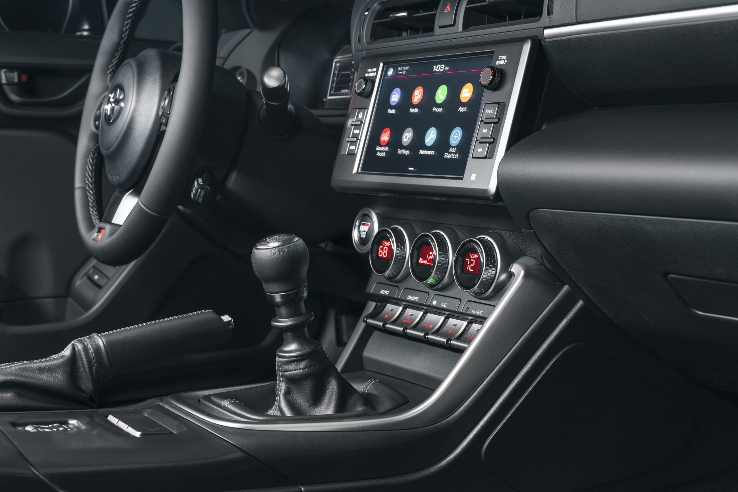 The manual transmission shifter in a 2022 Toyota GR86. Continued use of manual transmissions is one of the best car trends in recent memory