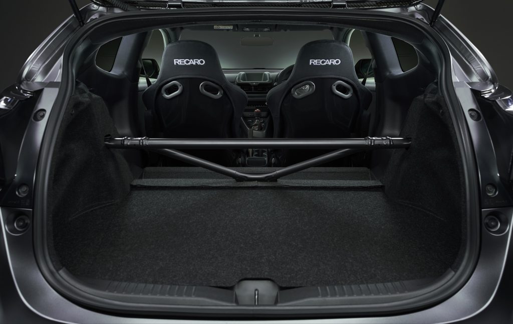 The rear strut-tower brace and Recaro seats in a gray 2022 Toyota GRMN Yaris Circuit Package