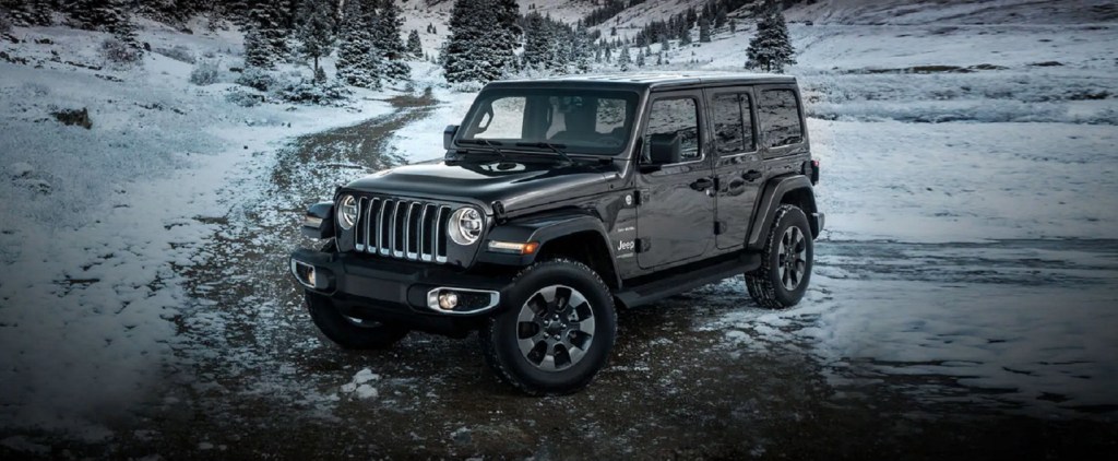 A black 2022 Jeep Wrangler in the snow.