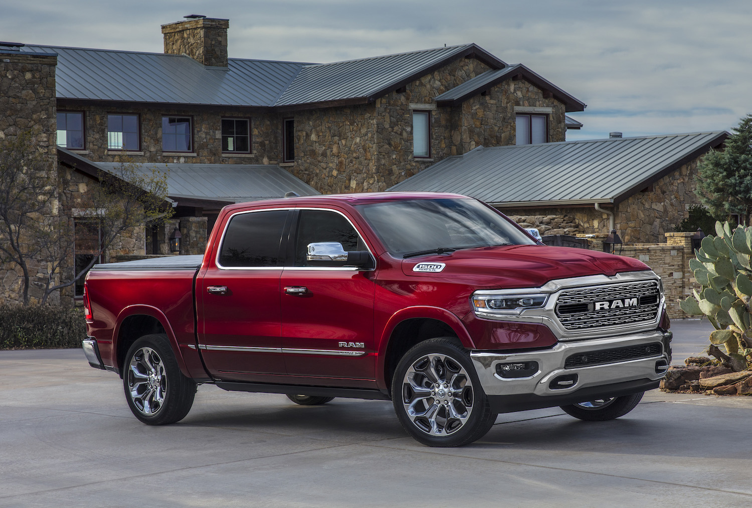 Promo photo of a red 2022 Limited trim level of a Ram 1500 | Stellantis