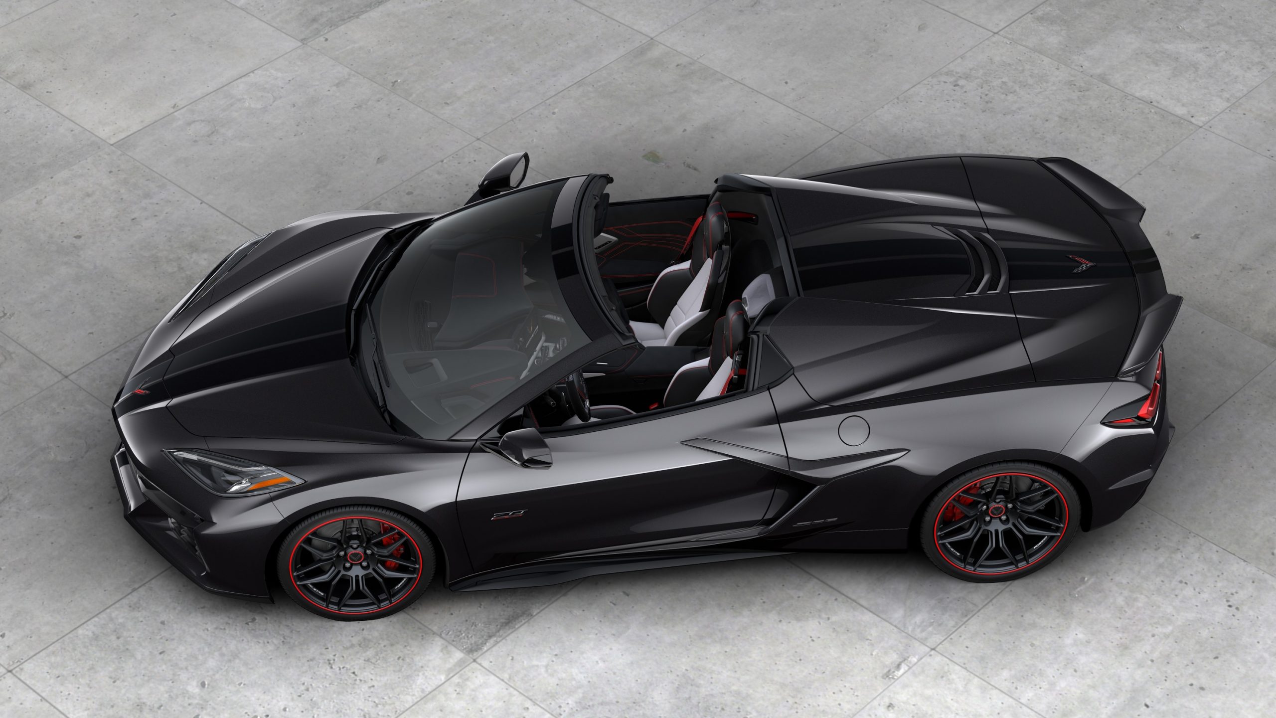 A 2023 Chevrolet Corvette Z06 70th Anniversary Edition Carbon Flash Metallic with its roof off