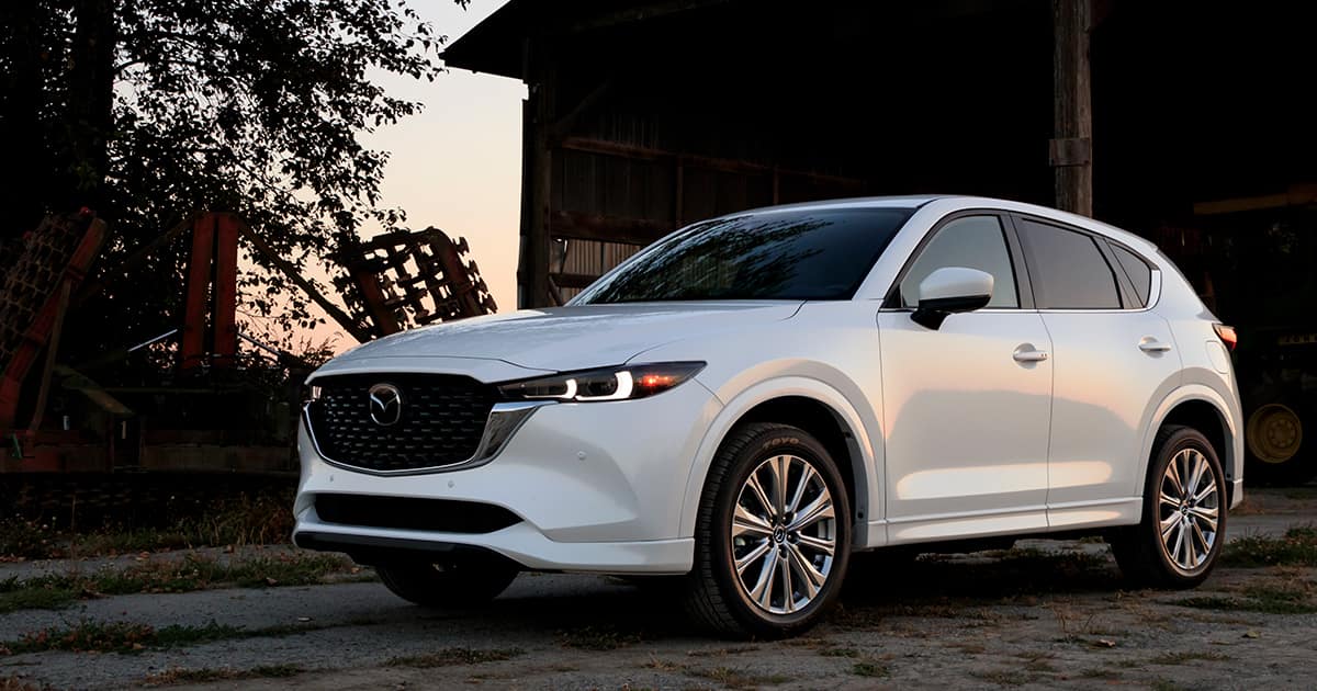 The 2023 Mazda CX-5 parked outdoors at dusk