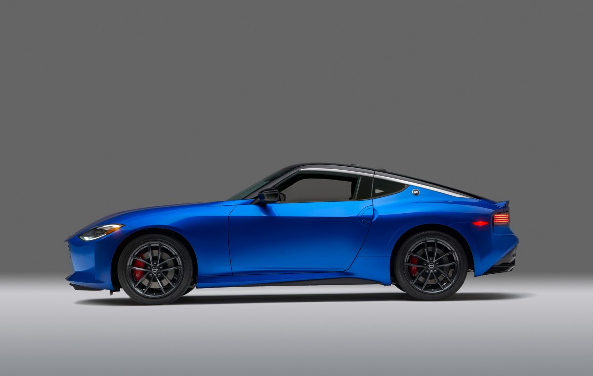 A profile view of a blue Nissan 400Z.