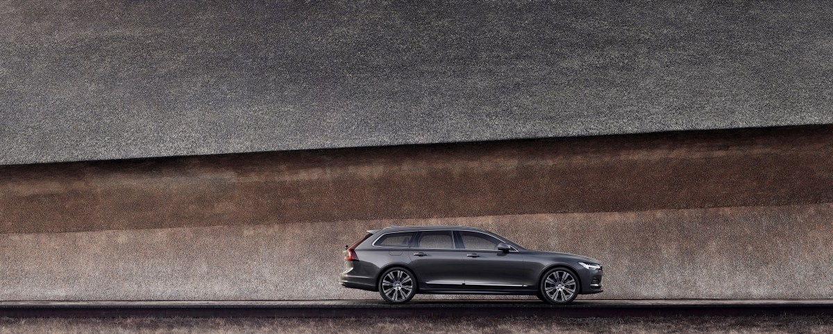 A profile view of the Volvo V90 T8 AWD Plug-In Hybrid. 
