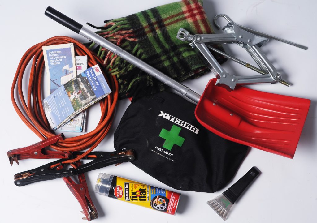 A selection of items in a sample winter emergency car tool kit