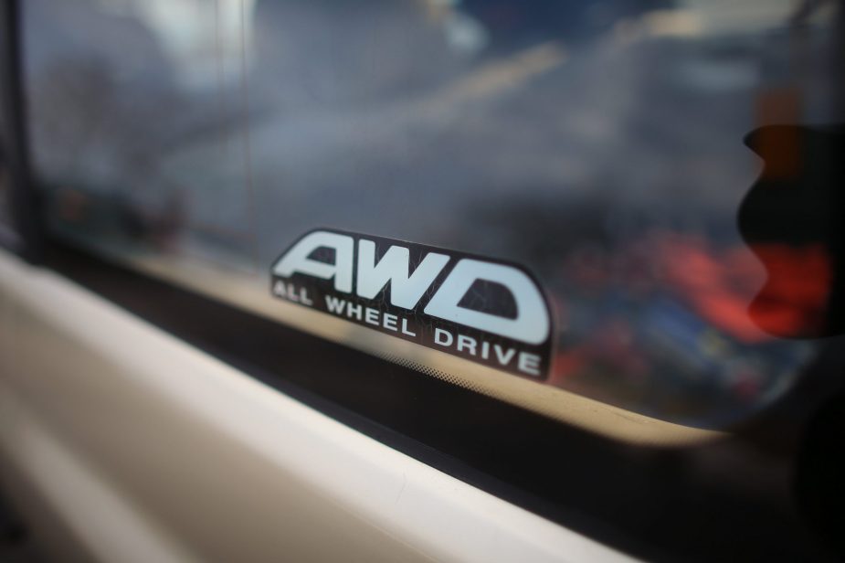 The AWD badge on a Subaru sedan