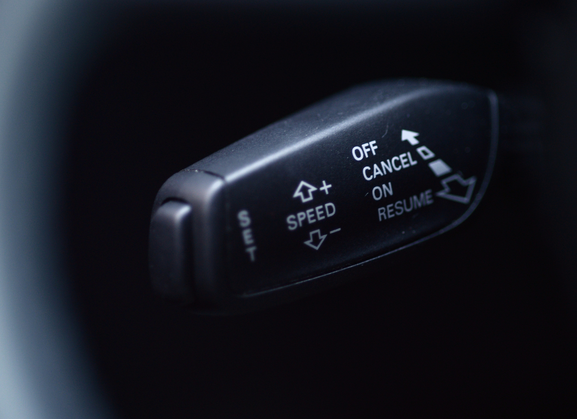 A cruise control stalk used for operating adaptive cruise control