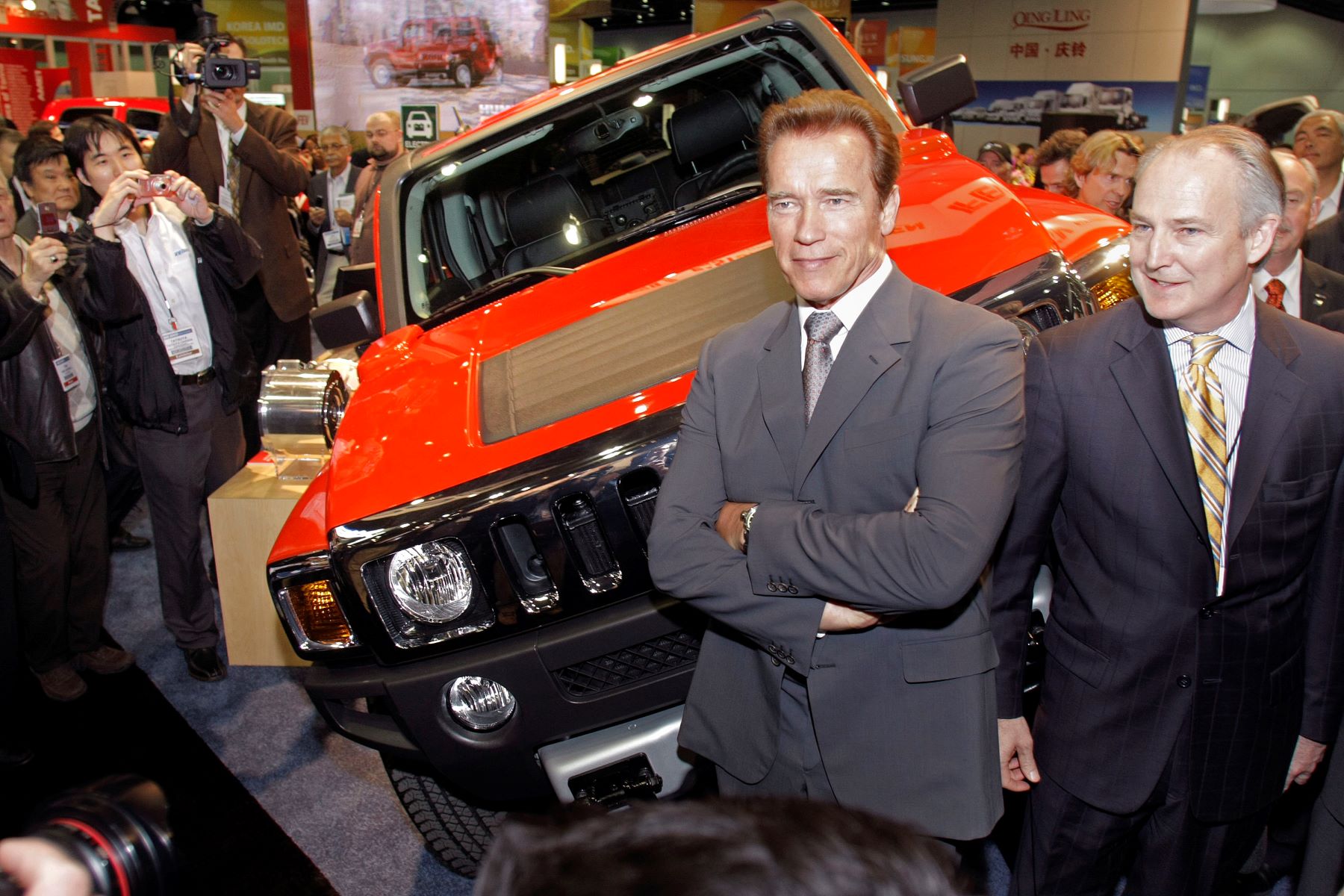 California Governor Arnold Schwarzenegger in front of the new Hummer H3 at the Society of Automotive Engineers World Congress in Detroit, Michigan, in 2009