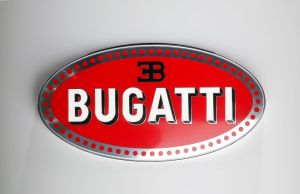 A red Bugatti logo with white and black writing on a white background. 