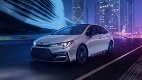 Cement 2022 Toyota Corolla driving on a city street, highlighting the advantages of ToyotaCare