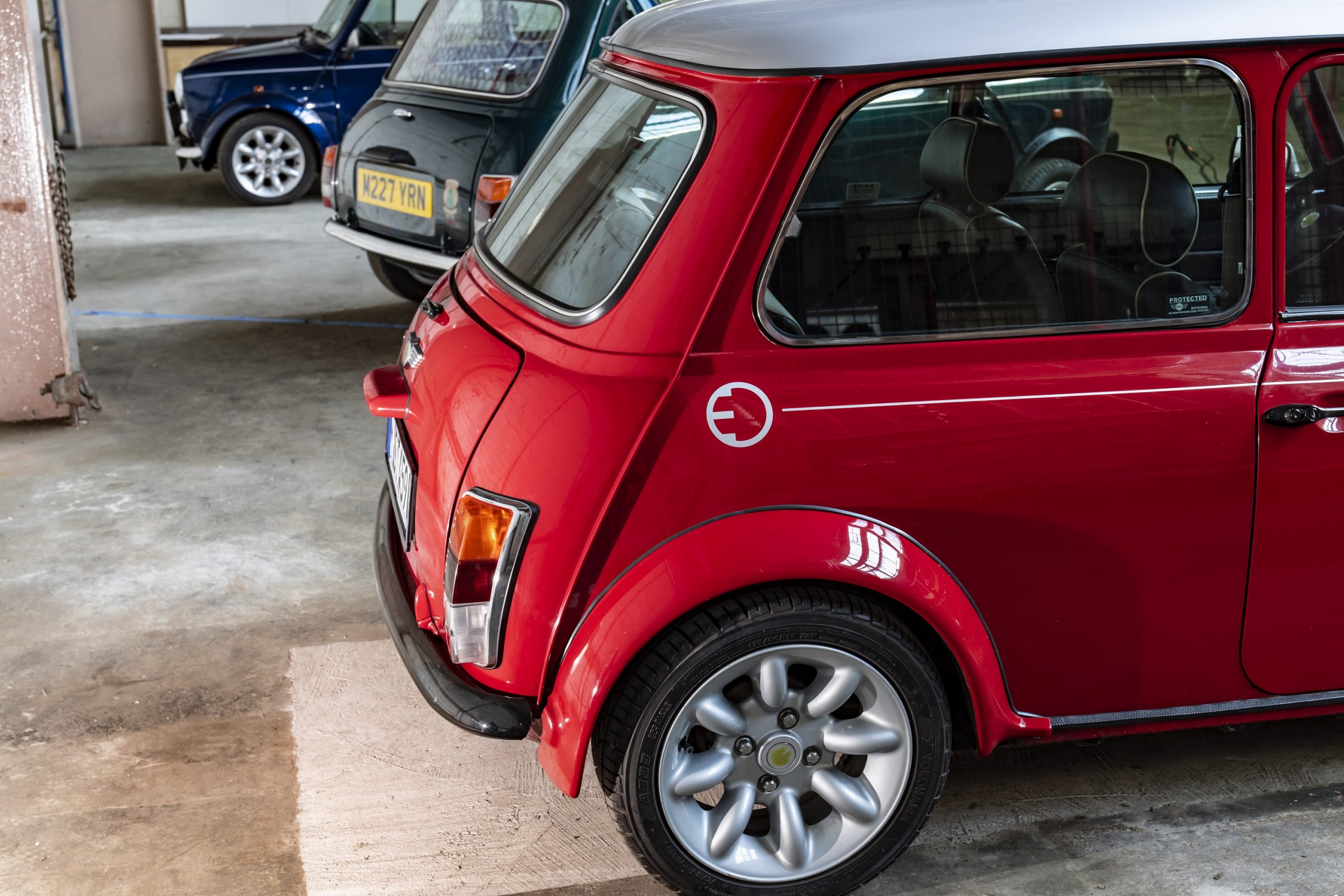 The rear of a red Mini Cooper EV seen in Mini's plant in the UK