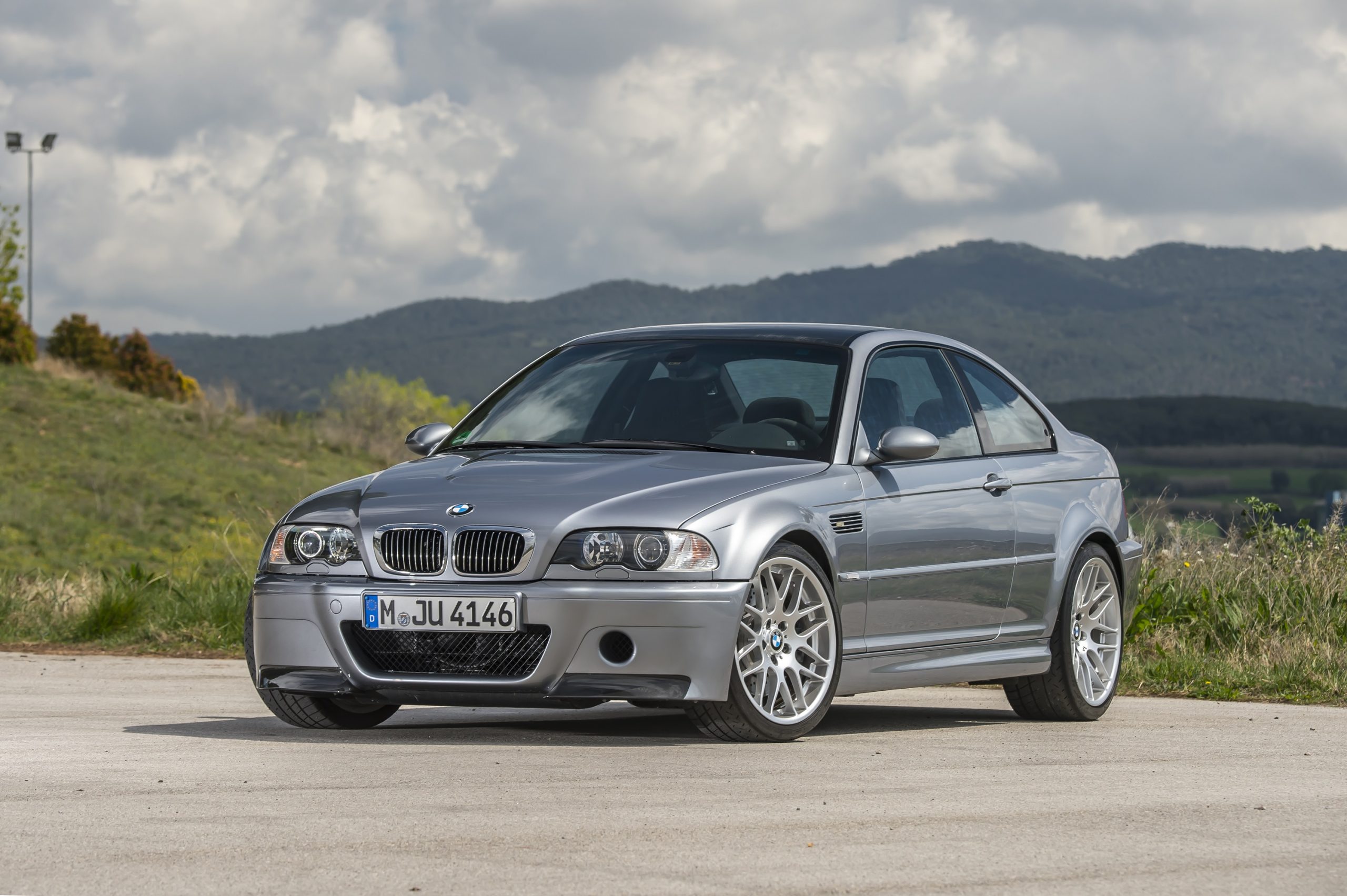 A silver E46 BMW M3 CSL shot from the front 3/4