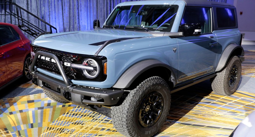 A blue Ford Bronco compact SUV is on display.