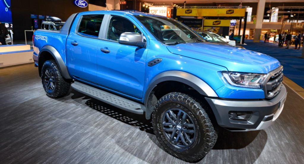 A blue Ford Ranger is on display.  
