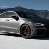 Fully loaded new Mountain Grey Mango 2022 Mercedes-Benz AMG CLA 45 Coupe with mountains in the background