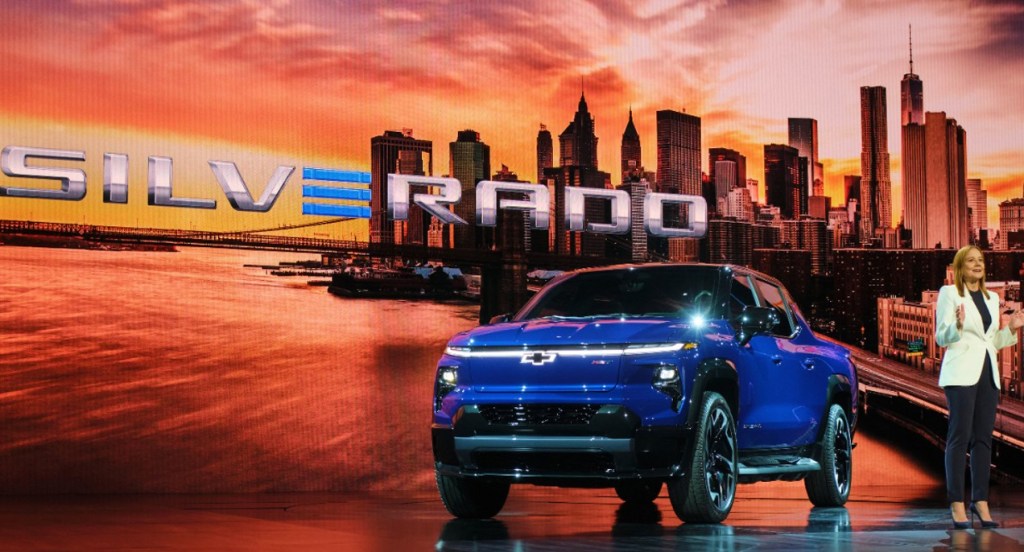 A blue 2024 Chevrolet Silverado EV is on display. 