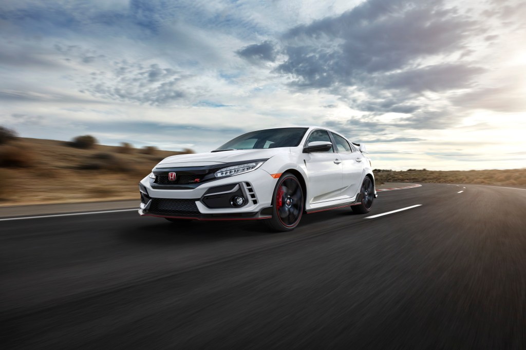 A white Honda Civic Type R shot from the front 3/4