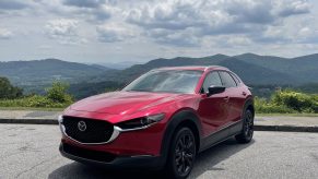 The 2021 Mazda CX-30 parked in front of mountains