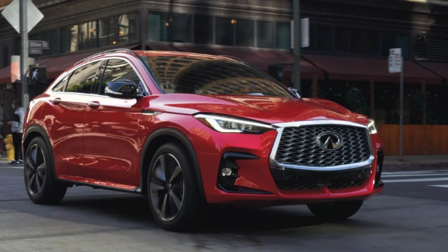 A red 2022 Infiniti QX55 is parked.