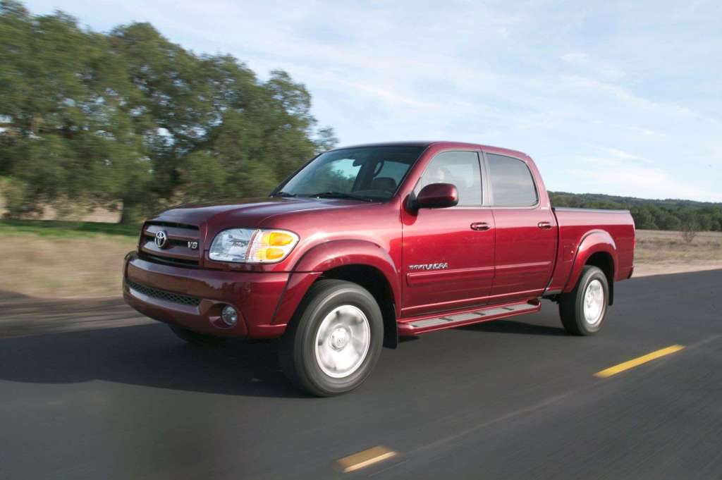 Maroon 2004 Toyota Tundra driving on a highway