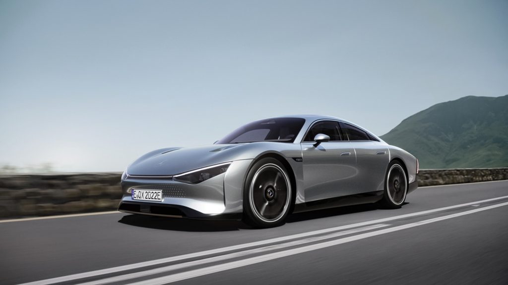 The silver Mercedes Vision EQXX Concept driving down a road