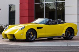 Panoz Esperante Spyder GT sports car convertible model with a yellow paint color option